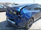 Tesla Model Y Performance Dual Motor All-Wheel Drive 7SAYGDEF8PF587081 photo