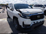 Honda Passport Awd Ex-L 5FNYF8H54NB009745 photo