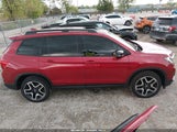 Honda Passport Awd Elite 5FNYF8H04PB027945 photo