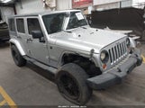 Jeep Wrangler Unlimited Sahara 1J4GB59167L157021 снимка