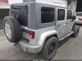 Jeep Wrangler Unlimited Sahara 1J4GB59167L157021 снимка