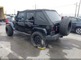 Jeep Wrangler Unlimited Sahara 1J4BA5H12BL563708 photo