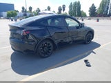Tesla Model Y Long Range Dual Motor All-Wheel Drive 7SAYGAEE1NF387744 снимка