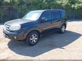 Honda Pilot Touring 5FNYF48939B040325 снимка
