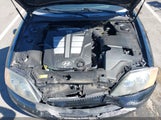 Hyundai Tiburon Gt V6/Gt V6 Special Edition KMHHN65F34U128649 photo