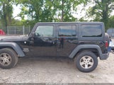 Jeep Wrangler Unlimited Sport 1C4HJWDGXGL300941 photo