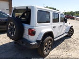 Jeep Wrangler Unlimited Sahara 4X4 1C4HJXEG8JW139287 снимка