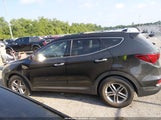 Hyundai Santa Fe Sport 2.4L 5NMZU3LB0HH008038 photo