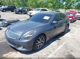 Infiniti G37X JN1CV6AR1BM412067 снимка