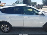 Toyota Rav4 Hybrid Xle JTMRJREV1JD197848 снимка