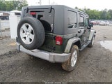 Jeep Wrangler Unlimited Sahara 1J4GA59138L553928 photo