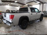 Nissan Titan Le/Pro-4X/Se/Xe 1N6AA07CX8N344738 photo