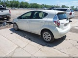 Toyota Prius C One JTDKDTB35E1077082 снимка
