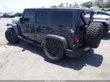 Jeep Wrangler Unlimited Smoky Mountain 4X4 1C4HJWEG7HL674987 снимка