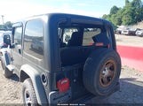 Jeep Wrangler Sport Rhd 1J4F449S85P375735 photo