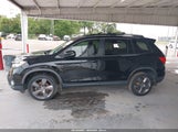 Honda Passport Awd Touring 5FNYF8H90LB014361 fotografie