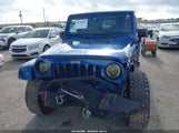 Jeep Wrangler Unlimited Sahara 1J4BA5H15AL185060 fotografie