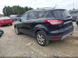 Ford Escape Titanium 1FMCU9JX2GUA17172 photo
