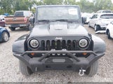 Jeep Wrangler Unlimited Sahara 1J4BA5H16AL207843 снимка