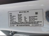 Tesla Model 3 5YJ3E1EA7PF550703 photo
