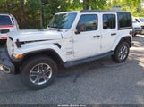 Jeep Wrangler Unlimited Sahara 4X4 1C4HJXEN0KW590312 photo