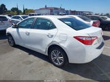 Toyota Corolla Le Plus 5YFBURHE5FP231184 photo