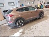 Hyundai Tucson 1.6T KM8J3CA21GU038395 снимка