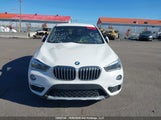 BMW X1 WBXHT3C38J3H31122 снимка