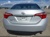 Toyota Corolla 2T1BURHE8JC024300 снимка