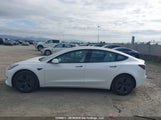 Tesla Model 3 Rwd 5YJ3E1EA5PF558704 fotografie