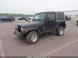 Jeep Wrangler / Tj Sahara 1J4FA59S44P740456 снимка