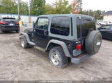 Jeep Wrangler / Tj Sport 1J4FY19S8XP489658 снимка