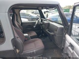 Jeep Wrangler / Tj Sport 1J4FY19S8XP489658 снимка