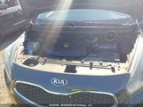 Kia Rondo KNAHT8A34E7024170 снимка