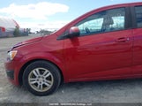 Chevrolet Sonic Ls 1G1JA6EH7C4110987 снимка