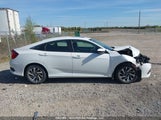 Honda Civic Ex 2HGFC2F7XKH033699 снимка