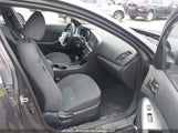 Kia Optima Lx/Lx Winter Edition KNAGM4A77F5570916 снимка