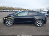 Tesla Model Y 5YJYGAEE3MF306643 photo