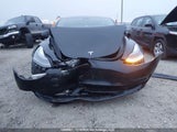 Tesla Model 3 5YJ3E1EA7PF499395 снимка