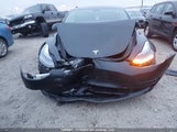 Tesla Model 3 5YJ3E1EA7PF499395 fotografie