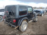 Jeep Wrangler / Tj Sahara 1J4FA59S72P733935 снимка