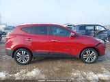 Hyundai Tucson KM8JUCAG4EU871694 снимка