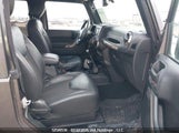 Jeep Wrangler Sahara 1C4AJWBG6GL256179 снимка