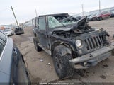 Jeep Wrangler Unlimited Sahara 1C4BJWEGXGL332499 photo