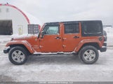 Jeep Wrangler Unlimited Sahara 1J4BA5H1XBL594110 photo