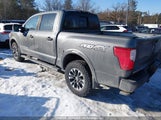 Nissan Titan Sv/Platinum/Pro-4X/Platinum Reserve 1N6AA1E54KN523181 photo