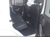 Jeep Wrangler Unlimited Sahara 1C4BJWEG6GL158396 снимка