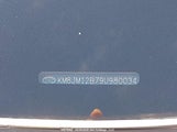 Hyundai Tucson KM8JM12B79U980034 снимка