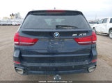 BMW X5 xDrive50I 5UXKR6C54F0J74427 photo