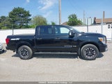 Nissan Titan Platinum/Pro-4X/S/Sl Midnight Edition/Sv/Sv Midnight Edition 1N6AA1E58JN522226 photo